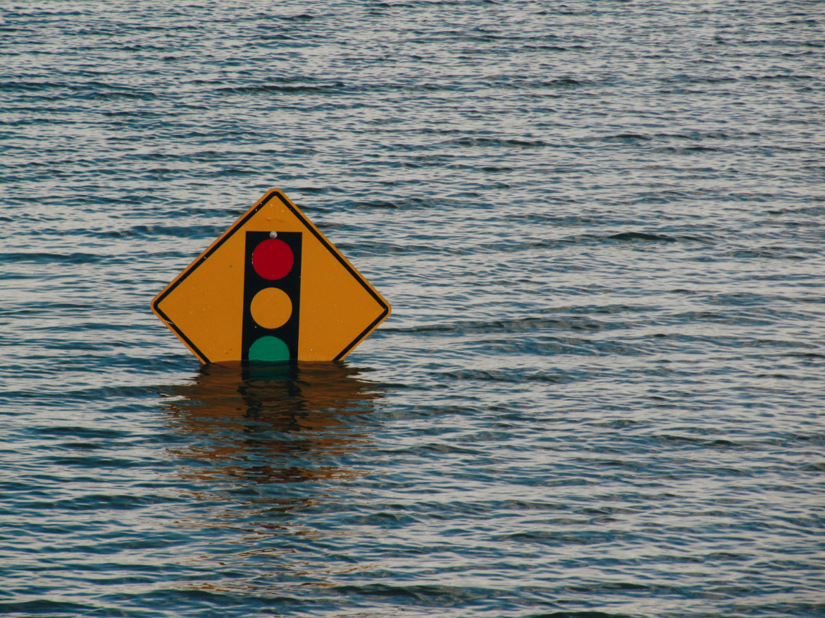 Sign in flood waters