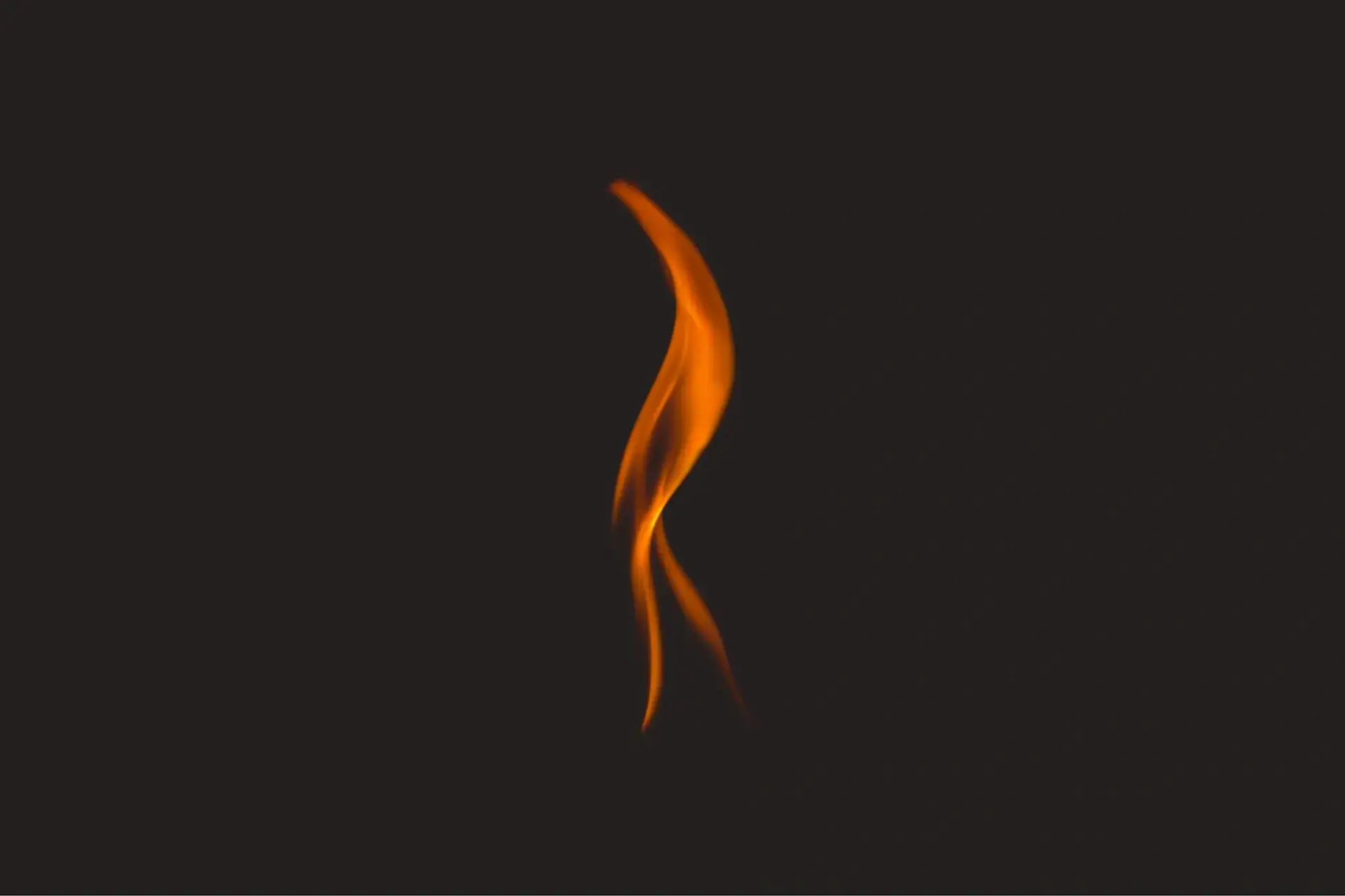 Single flame in dark background